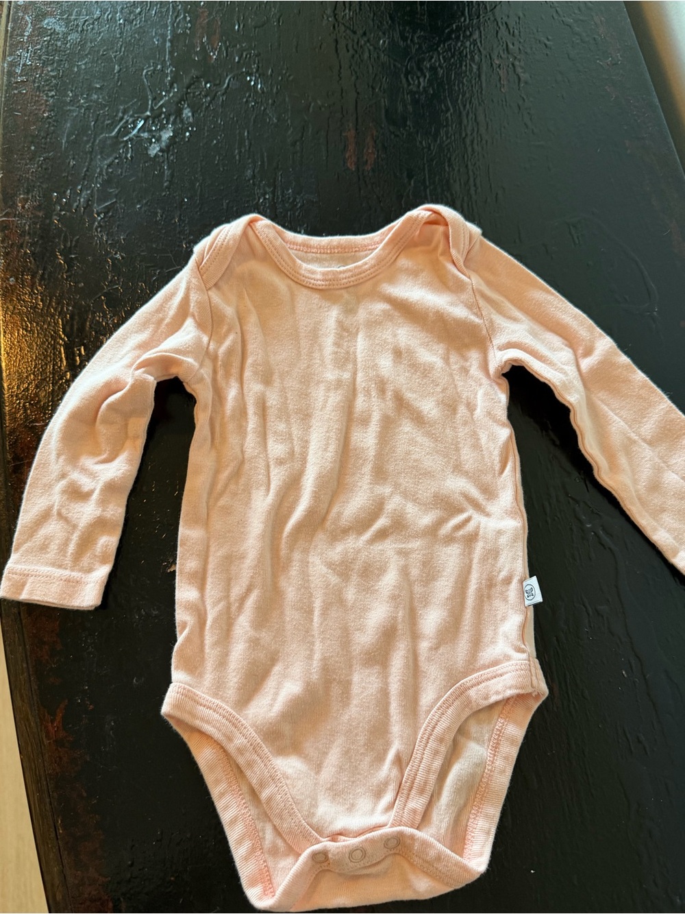 The Honest Company Long-Sleeve Baby Bodysuit in Light Peach